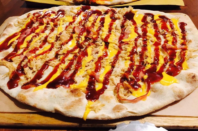 officine resta roma pizza burger polpette birra alla spina pizza e birra a roma all you can eat portuense ristorante pizzeria