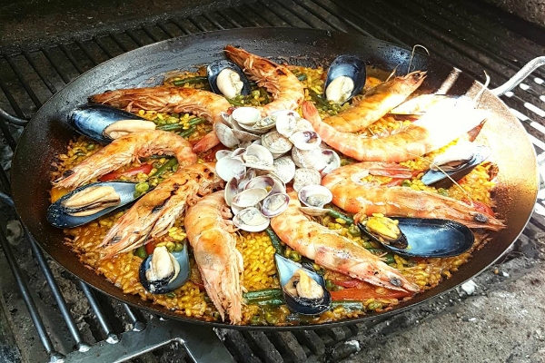 risorart roma ristorante fusion paella valenciana venerdì marisca pesce fresco cotta a legna migliori cinque paelle a roma
